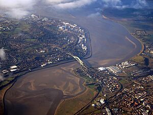Aerial view of the Silver Jubilee Bridge and the two towns of Runcorn (left) and Widnes (right)
