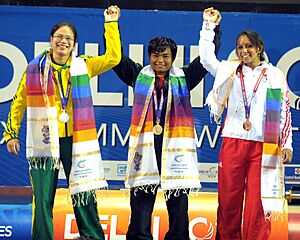 XIX Commonwealth Games-2010 Delhi Winners of 58 Kg Women’s Weightlifting event, Ranu Bala Chanu Yumnam of India (Gold), Seen Lee of Australia (Silver) and Zoe Smith of England (Bronze), during the medal presentation ceremony