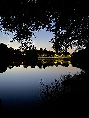 2021- picture of Lymm Dam reflected against the sky. JPG