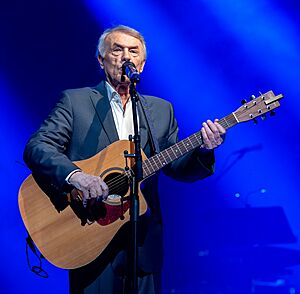 Adamo met gitaar