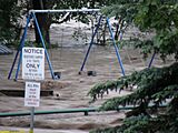 Okotoks - June 20, 2013 - Flood waters in local campground playground-03