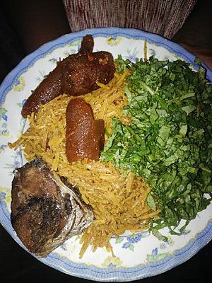 Abacha with kpomo, fish and utazi