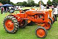 Allis-Chalmers Allis-Chalmers Model B tractor next to a Fordson