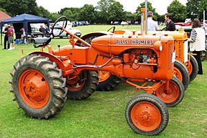 Allis-Chalmers Allis-Chalmers Model B tractor next to a Fordson