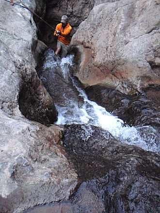 Canyoneering in hot spring water (30766262623).jpg