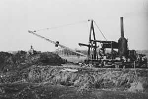 Digging a canal in swamp reclamation work at Merrimac, ca. 1910