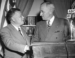 Harry Truman and David Dubinsky at a podium with an ABC microphone