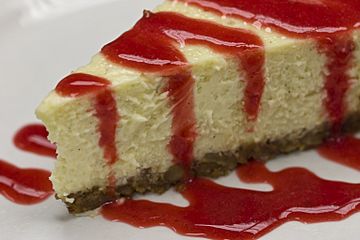 Mondays at Il Forno - Cheesecake with strawberry sauce