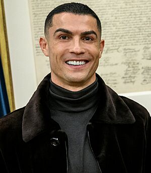 President Donald Trump meets with Cristiano Ronaldo in the Oval Office (54933344262) (cropped and rotated).jpg