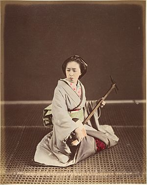 Tokyo Geisha with Shamisen c1870s,