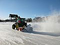 Tractor with a snowblower in Kuopio