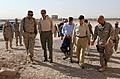 US Navy 050901-M-1327J-002 U.S. Senators John Kerry of Massachusetts, Ted Stevens of Alaska, and John Warner of Virginia, walk with U.S. Marine Corps Maj. Gen. Stephen Johnson and Brig. Gen. John E. Wissler to the Marine Armor I