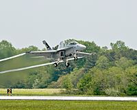 US Navy 100422-N-XXXXS-001 The Navy celebrates Earth Day by showcasing a supersonic flight test of the Green Hornet, an F-A-18 Super Hornet strike fighter jet powered by a 50-50 biofuel blend