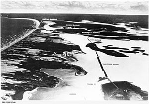 Aerial view of River Murray barrages with superimposed text - PRG-1258-2-546
