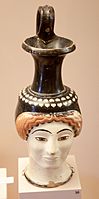 Attic vase in the shape of female head