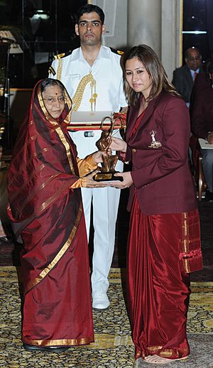 The President, Smt. Pratibha Devisingh Patil presenting the Arjuna Award for the year-2011 to Ms. Jwala Gutta for Badminton, in a glittering ceremony, at Rashtrapati Bhavan, in New Delhi on August 29, 2011