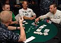 US Navy 090620-N-2798F-033 Sailors assigned to the aircraft carrier USS Harry S. Truman (CVN 75) and Carrier Air Wing (CVW) 3 compete in a Texas Hold 'Em Poker tournament aboard Harry S. Truman