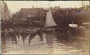 Washington edu Waterfront, w moored Indian canoes, Seattle, c 1892, NA897