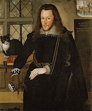 Henry Wriothesley, 3rd Earl of Southampton, in the Tower of London in 1603, at age 30; painting attributed to John de Critz. A small painting of the Tower of London is shown in the top-right background, above the Latin words: In vinculis invictus ("in chains unconquered") February 8, 1600; 601; 602; 603 April. The arms of Wriothesley (Azure, a cross or between four hawks close argent) are shown on the cover of a book lying on the windowsill in front of the cat.