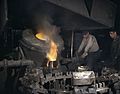 Casting a billet from an electric furnace at Chase Brass and Copper Co - Euclid Ohio