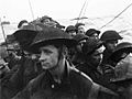 Film still from the D-Day landings showing commandos aboard a landing craft on their approach to Sword Beach, 6 June 1944. BU1181