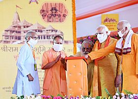 Narendra Modi unveiling the plaque to lay the foundation stone of Ram Janmabhoomi Mandir, in Ayodhya, Uttar Pradesh on August 05, 2020. The Chief Minister of Uttar Pradesh, Yogi Adityanath and other dignitaries are also seen