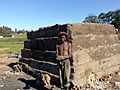 Xhosa brickmaker at kiln near Ngcobo