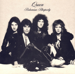 The four members of the band sit together in front of a sandy-coloured background wearing predominantly black clothing. Mercury appears to be the dominant figure, sat in front of the other three members. From left to right, John Deacon, Mercury, Brian May, Roger Taylor. All four individuals are looking directly at the camera with a neutral expression on their faces. Above the band is some black text, printed in an elegant, italic font face. The word "Queen" is followed by "Bohemian Rhapsody", the latter of which is positioned under the band name in the same format yet smaller font.