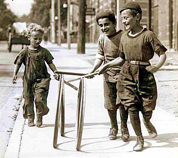 Boys with hoops on Chesnut Street