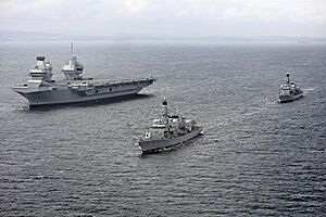 HMS Queen Elizabeth (R08) underway during trials with HMS Sutherland (F81) and HMS Iron Duke (F234) on 28 June 2017 (45162784)