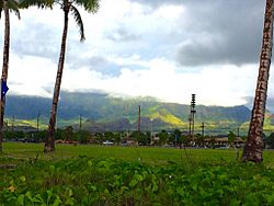 Māʻili with the Lualualei Valley and the Waianae Range in the background.