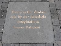 Poetry is the shadow cast by our streetlight imaginations by Lawrence Ferlinghetti - Jack Kerouac Alley