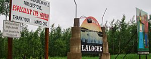 Signs by the La Loche Airport