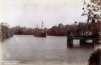 StateLibQld 1 115300 Boat approaching the wharf on Proserpine River, Queensland, ca. 1899.jpg