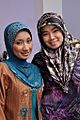 Two Muslim women in tudungs at an engagement party, Brunei - 20100531