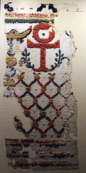 Egitto, epoca romana o bizantina, frammento di drappo da appendere a tema cristiano, lino e lana
