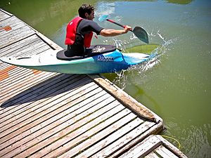 Kayaker launches into flat water