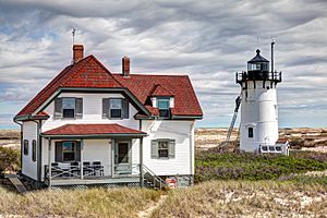 Race Point Lighthouse being painted 2012.jpg