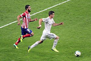 Real Madrid vs Atlético Madrid - 28 September 2013 - Arda Turan and Gareth Bale