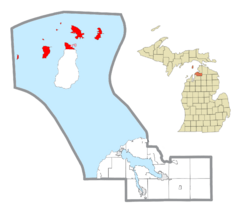 Location within Charlevoix County (red) and the administered community of St. James (pink)