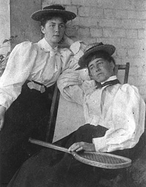 StateLibQld 1 42023 Two women dressed for a game of tennis, 1890-1900