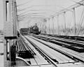 StateLibQld 2 270069 Steam engine crossing the Alexandra Railway Bridge at Rockhampton, 1899