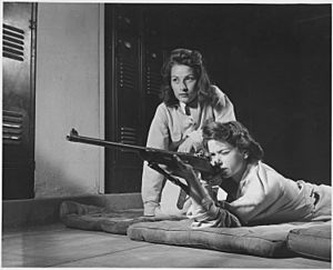 Training in marksmanship helps girls at Roosevelt High School in Los Angeles, Calif., develop into responsible women.... - NARA - 196476