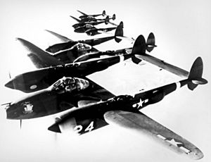 4 Lockheed P-38 Lightnings in formation