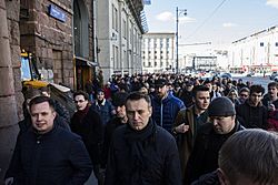 Alexei Navalny marching in 2017