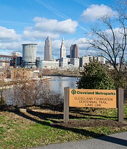 wooden sign in front of the Cleveland, Ohio, skyline