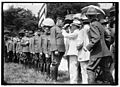 HARVEY, WILLIAM E. COLONEL, N. A. BEING DECORATED BY SEC. BAKER LCCN2016870164