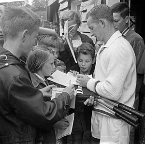 Rod Laver signing autographs Dutch Championships 1962