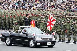 Shinzō Abe reviewing military parade