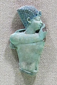 Applique in faience per tempietti in legno, XXX dinastia, torso di re 380-342 ac.